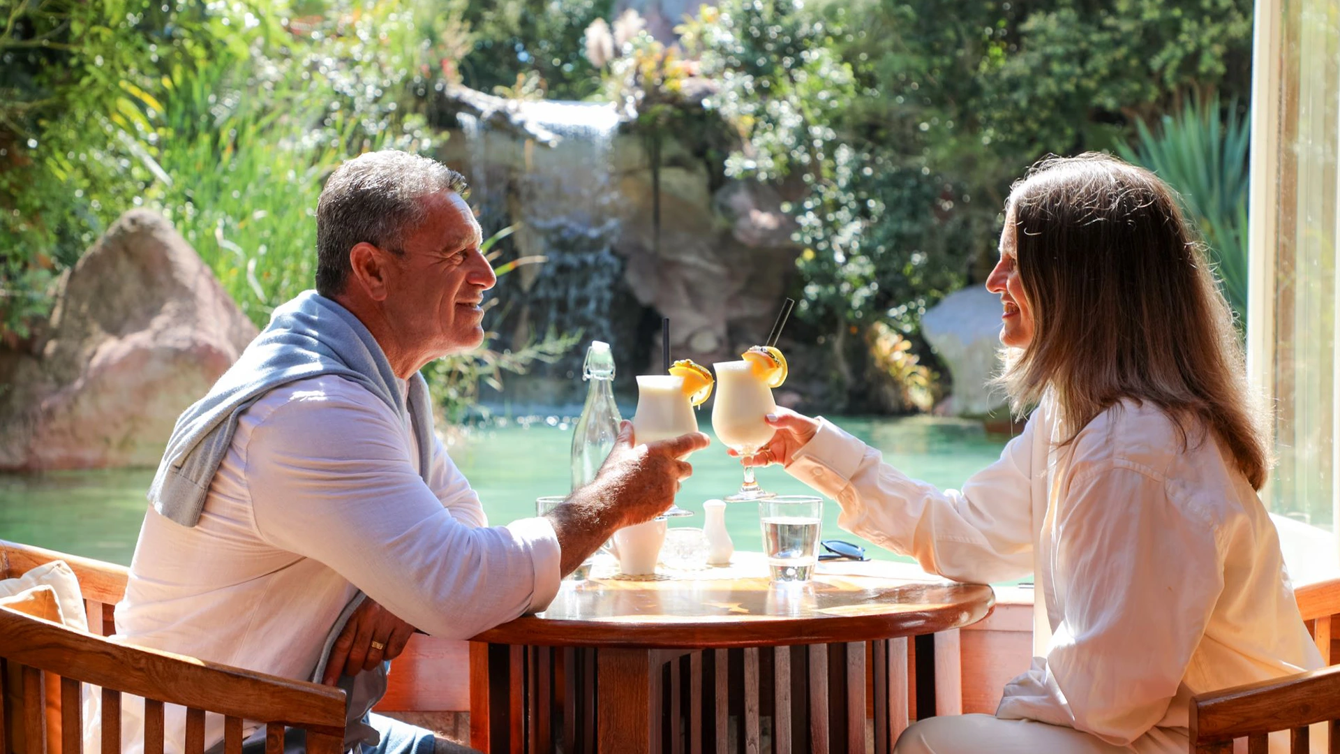 Couple at lost spring spa enjoying cocktails