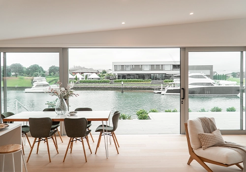 Indoor outdoor flow overlooking water